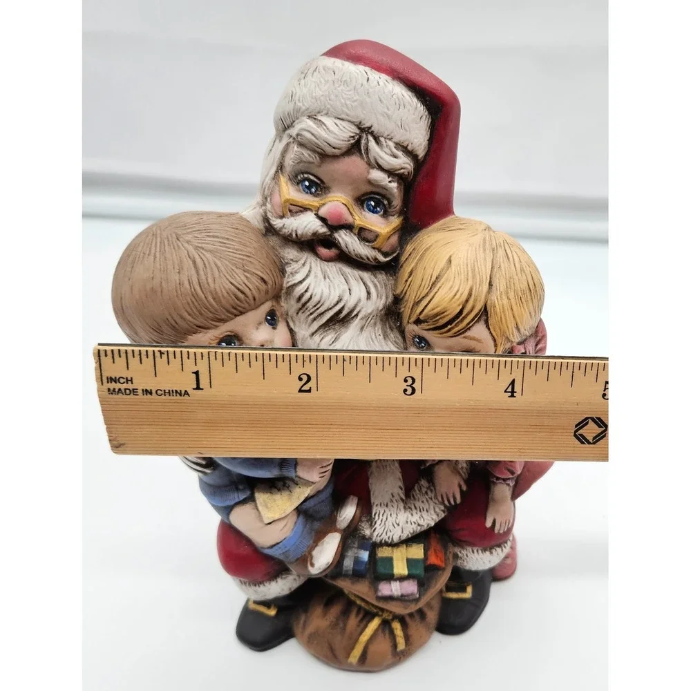 Vintage Ceramic Santa Claus Holding Children Christmas‎ Figurine 1993
